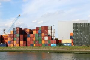 A body of water with a bunch of containers on top of it