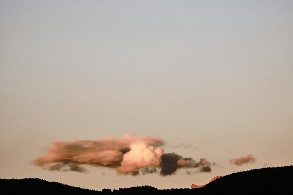A large cloud of smoke is in the sky